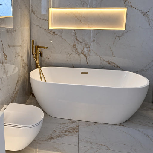 White freestanding bathtub with brass floor tap and overflow outlet, oval 1650x700mm