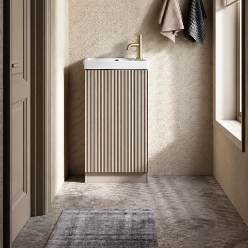 Soft coffee fluted vanity unit with white ceramic basin and brass-style faucet