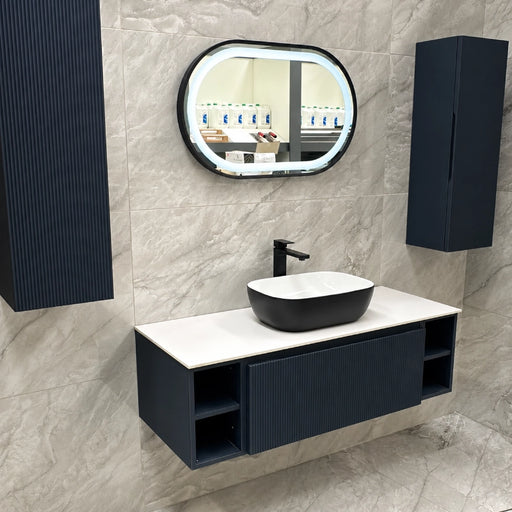 Wall-hung bathroom vanity unit in dark navy with countertop and fluted cabinet doors