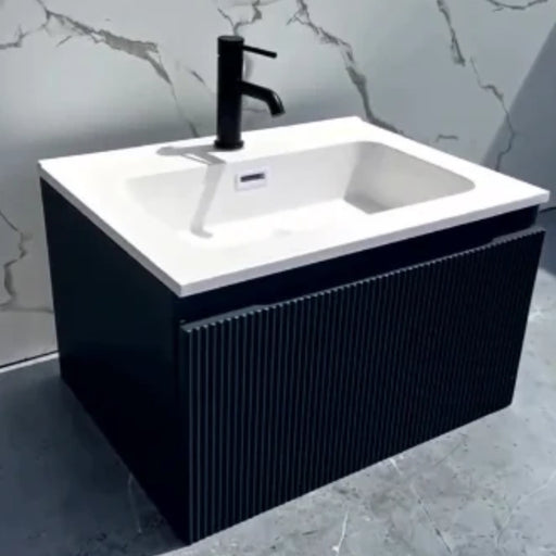Dark fluted wall-hung vanity unit with white basin