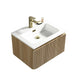 Wall-hung vanity with white basin, country oak fluted front and brass deck-mounted tap