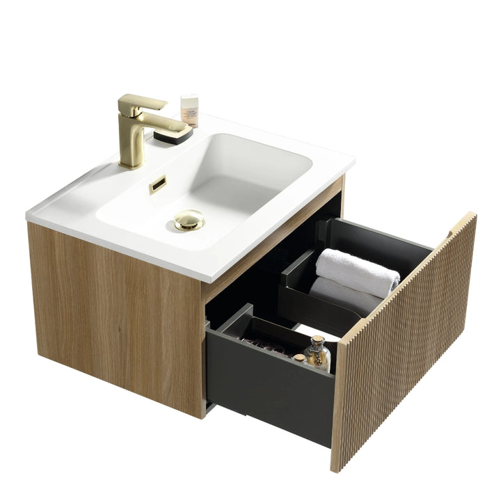 Wall-hung vanity unit with white basin, country oak cabinet with open drawer and towels