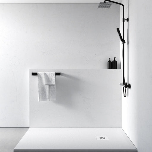 White rectangular shower tray with low-profile built-in waste drain