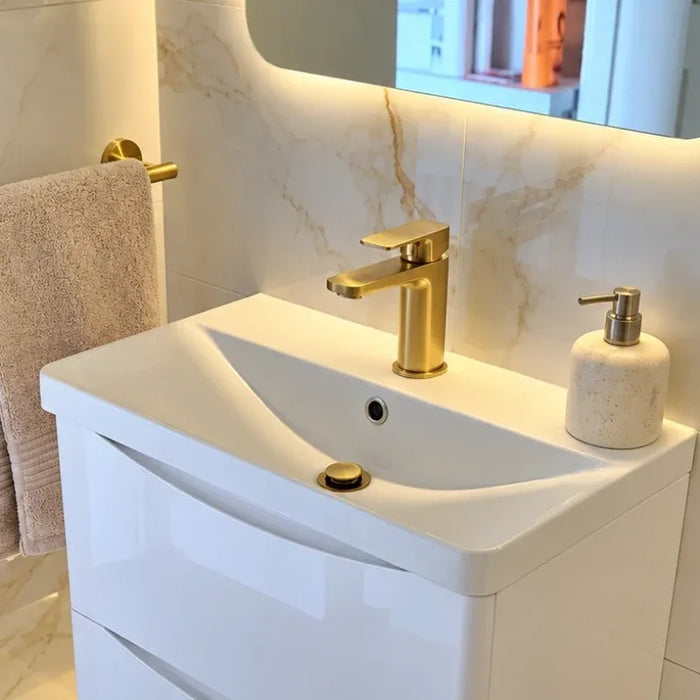 Brushed brass basin mixer tap with single lever and pop-up waste